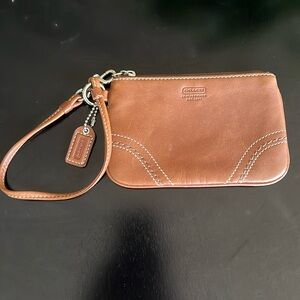 Brown leather Coach Wristlet